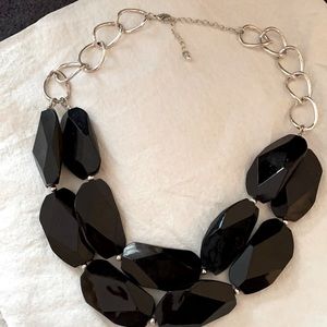 Black and silver tone neckpiece